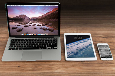 image of a laptop, an ipad and an iphone